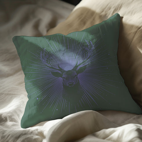 A pillow cover featuring a serene stag's face detailed in soft lavender, surrounded by radiating light beams on forest green fabric. Tiny stars twinkle throughout the design.